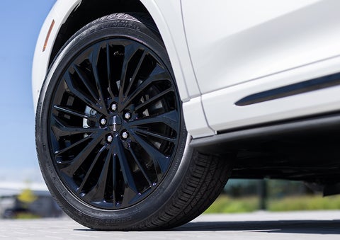 The stylish blacked-out 20-inch wheels from the available Jet Appearance Package are shown. | Midland Lincoln in Midland MI