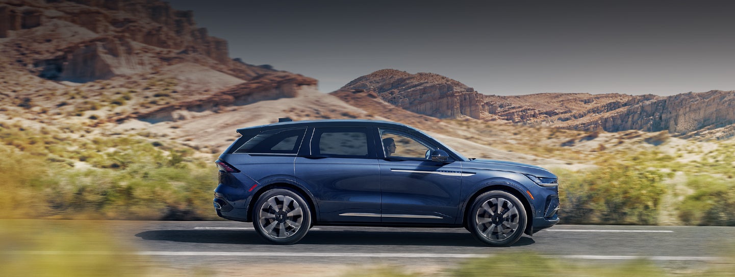 A 2024 Lincoln Nautilus® SUV is being driven in a desert setting. | Midland Lincoln in Midland MI