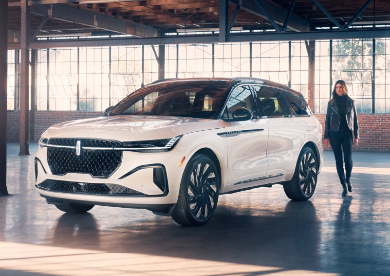 A person approaches a 2024 Lincoln Nautilus® SUV. | Midland Lincoln in Midland MI