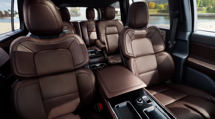 The cabin of the 2025 Lincoln Aviator® SUV is shown with black and brown accents. | Midland Lincoln in Midland MI