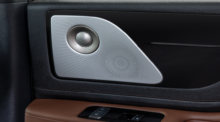 A close-up of a speaker located on the door’s interior is shown. | Midland Lincoln in Midland MI