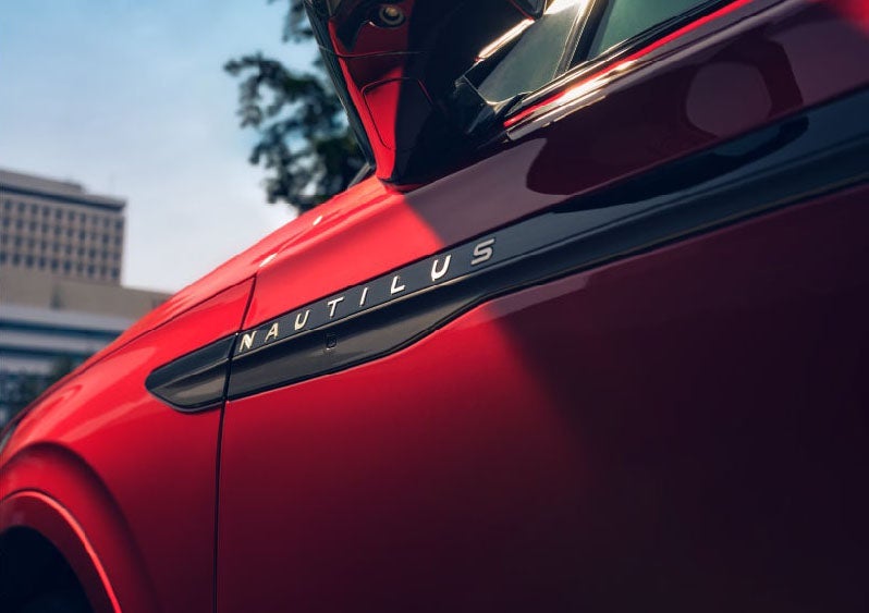 A side badge on the passenger door reads Nautilus. | Midland Lincoln in Midland MI