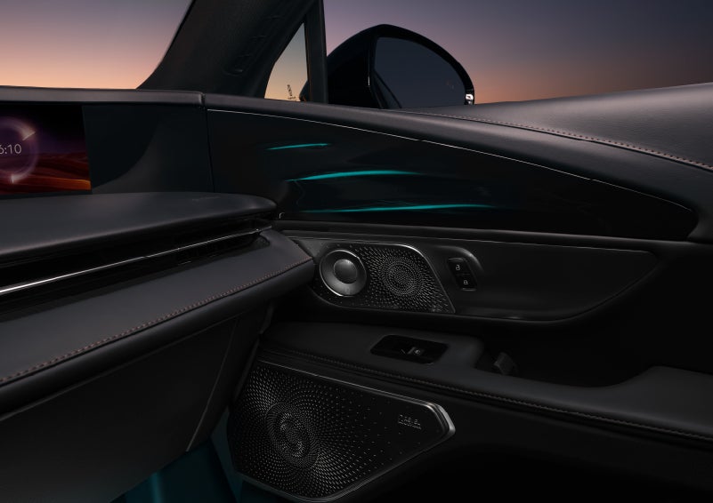 Selectable ambient lighting glows in the passenger door panel. | Midland Lincoln in Midland MI