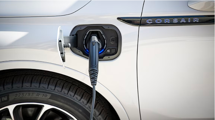 An electric charger is shown plugged into the charging port of a Lincoln Corsair® Grand Touring
model. | Midland Lincoln in Midland MI