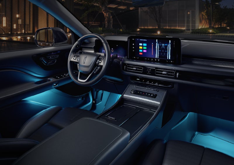 Deep blue ambient lighting glows from various places within a 2026 Lincoln Aviator® SUV. | Midland Lincoln in Midland MI