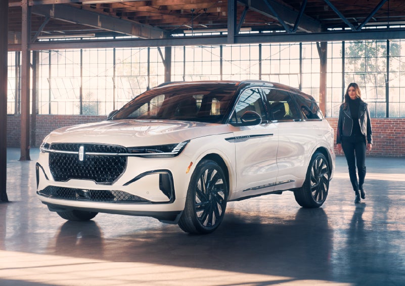 A person approaches a 2026 Lincoln Nautilus® SUV. | Midland Lincoln in Midland MI