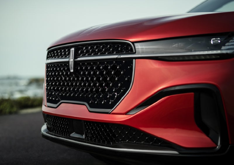 The sleek grille of a 2026 Lincoln Nautilus® SUV with the available Jet Appearance Package makes a bold statement. | Midland Lincoln in Midland MI