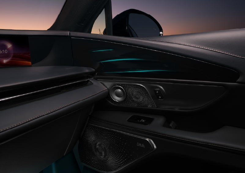 Selectable ambient lighting glows in the passenger door panel. | Midland Lincoln in Midland MI