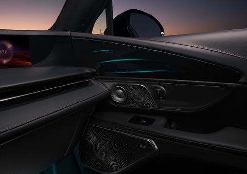 Selectable ambient lighting glows in the passenger door panel. | Midland Lincoln in Midland MI