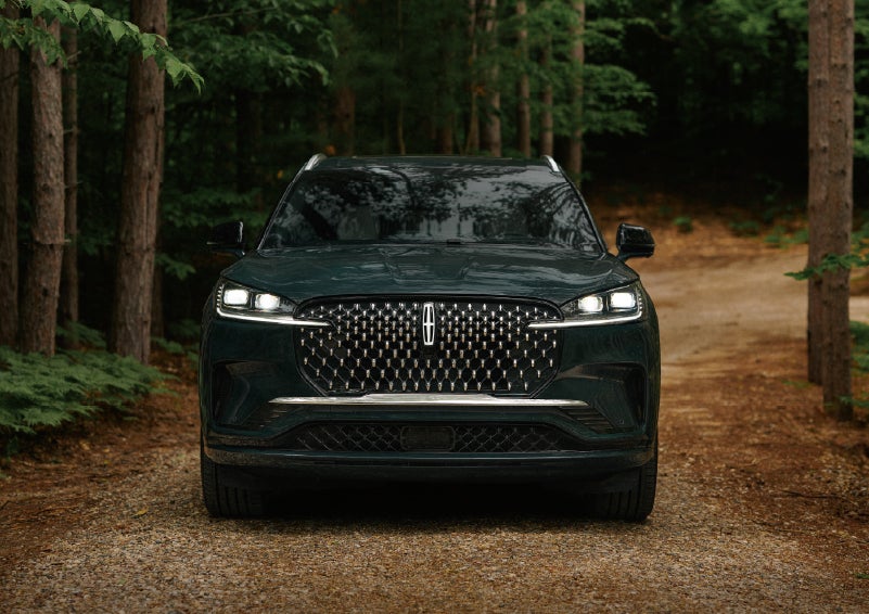 The front grille of a 2027 Lincoln Aviator® Black Label™ SUV is shown. | Midland Lincoln in Midland MI