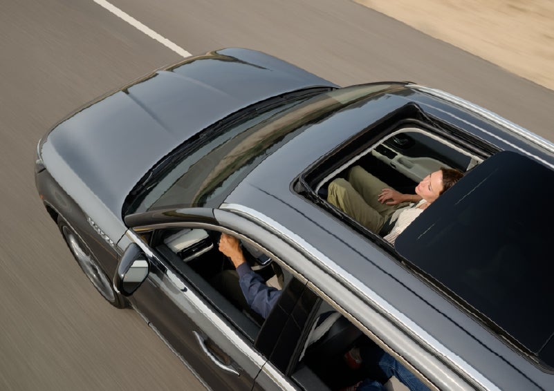 The available panoramic Vista Roof® of a 2027 Lincoln Aviator® SUV is open. | Midland Lincoln in Midland MI